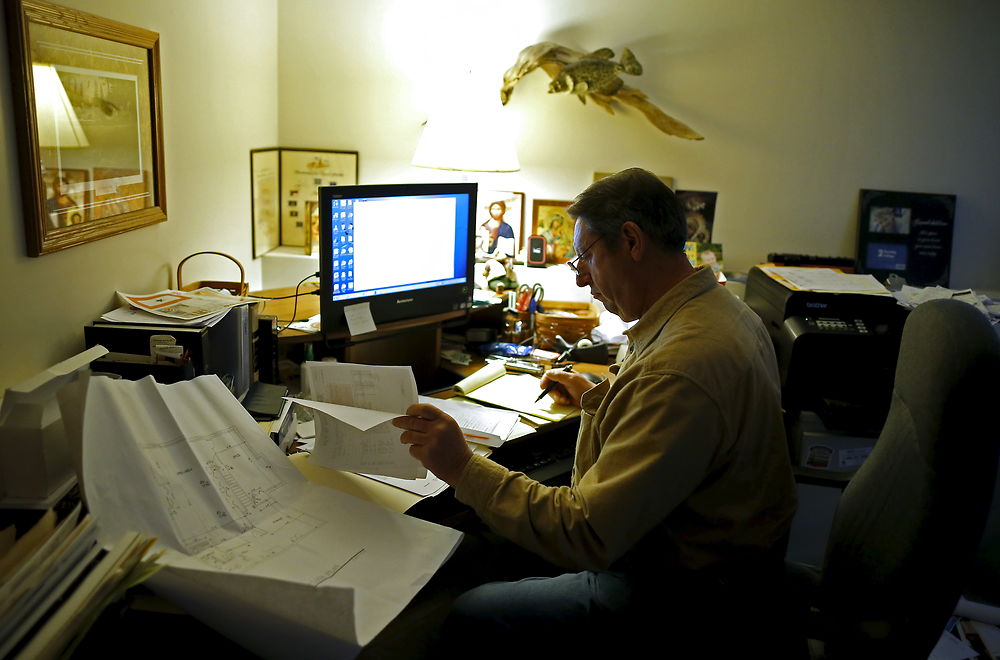 U.S. Republican presidential candidate Michael Petyo works in his home office in Hobart, Indiana, November 17, 2015. Reuters Photographer Jim Young: "Hillary and Donald are running. So are more than 1, 500 others, among them Michael Petyo of Hobart, Indiana. He's not a household name, nor does he have millions of dollars in backing. Petyo is a building contractor, a father and a U.S. Navy veteran. Back in May, Petyo handed me his card. He was outside an event in Des Moines, Iowa, attended by leading potential Republican candidates. Petyo said the party wouldn't let him inside. We only spoke for a minute. Months later, I read of a few hundred people having already signed up to run for president: businesspeople, teachers, bartenders. Petyo lives about 75 miles from me so I arranged to meet. We spoke for a couple of hours at his dinner table with his wife. This is my fourth presidential election campaign. I have logged countless miles and been to hundreds of events - but always with candidates with massive financial backing and support from countless volunteers. Petyo has business cards, his van, his beliefs. He speaks about the working class, faith, the military. In his spare time he bakes to raise money for the church. Religion is important to him and he speaks about it passionately. Over the months we meet up while he campaigns and goes about his life. Petyo drives to a Republican debate in Milwaukee in November; the door is shut there too. He still works the lines of attendees outside. In Chicago people brush by on a cold, windy day as he tries to introduce himself. Some stop to ask him about his policies. He is not a full-time politician, just a regular guy facing what many would call insurmountable obstacles. It's quite the understatement to say the odds are stacked against him. But that shouldn't stop him or anyone from trying." REUTERS/Jim Young SEARCH "PETYO" FOR ALL IMAGES