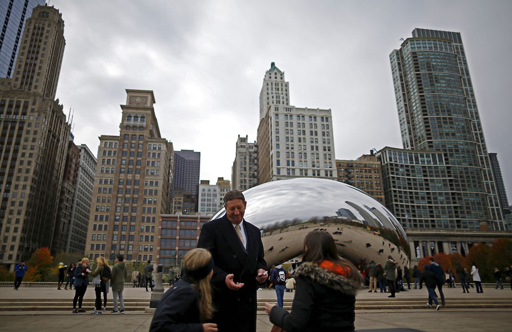 U.S. Republican presidential candidate Michael Petyo speaks to potential voters while campaigning in downtown Chicago, Illinois, November 20, 2015. Reuters Photographer Jim Young: "Hillary and Donald are running. So are more than 1, 500 others, among them Michael Petyo of Hobart, Indiana. He's not a household name, nor does he have millions of dollars in backing. Petyo is a building contractor, a father and a U.S. Navy veteran. Back in May, Petyo handed me his card. He was outside an event in Des Moines, Iowa, attended by leading potential Republican candidates. Petyo said the party wouldn't let him inside. We only spoke for a minute. Months later, I read of a few hundred people having already signed up to run for president: businesspeople, teachers, bartenders. Petyo lives about 75 miles from me so I arranged to meet. We spoke for a couple of hours at his dinner table with his wife. This is my fourth presidential election campaign. I have logged countless miles and been to hundreds of events - but always with candidates with massive financial backing and support from countless volunteers. Petyo has business cards, his van, his beliefs. He speaks about the working class, faith, the military. In his spare time he bakes to raise money for the church. Religion is important to him and he speaks about it passionately. Over the months we meet up while he campaigns and goes about his life. Petyo drives to a Republican debate in Milwaukee in November; the door is shut there too. He still works the lines of attendees outside. In Chicago people brush by on a cold, windy day as he tries to introduce himself. Some stop to ask him about his policies. He is not a full-time politician, just a regular guy facing what many would call insurmountable obstacles. It's quite the understatement to say the odds are stacked against him. But that shouldn't stop him or anyone from trying." REUTERS/Jim Young SEARCH "PETYO" FOR ALL IMAGES