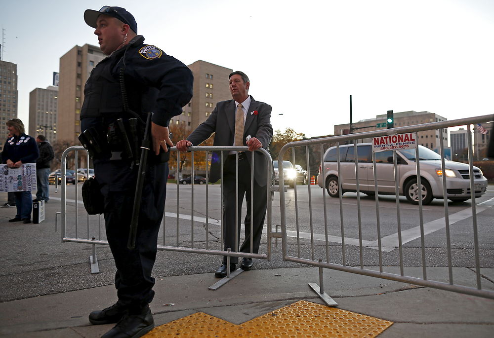 U.S. Republican presidential candidate Michael Petyo stands outside a security barricade hoping to get admission to a Republican presidential debate in Milwaukee, Wisconsin, November 10, 2015. Reuters Photographer Jim Young: "Hillary and Donald are running. So are more than 1, 500 others, among them Michael Petyo of Hobart, Indiana. He's not a household name, nor does he have millions of dollars in backing. Petyo is a building contractor, a father and a U.S. Navy veteran. Back in May, Petyo handed me his card. He was outside an event in Des Moines, Iowa, attended by leading potential Republican candidates. Petyo said the party wouldn't let him inside. We only spoke for a minute. Months later, I read of a few hundred people having already signed up to run for president: businesspeople, teachers, bartenders. Petyo lives about 75 miles from me so I arranged to meet. We spoke for a couple of hours at his dinner table with his wife. This is my fourth presidential election campaign. I have logged countless miles and been to hundreds of events - but always with candidates with massive financial backing and support from countless volunteers. Petyo has business cards, his van, his beliefs. He speaks about the working class, faith, the military. In his spare time he bakes to raise money for the church. Religion is important to him and he speaks about it passionately. Over the months we meet up while he campaigns and goes about his life. Petyo drives to a Republican debate in Milwaukee in November; the door is shut there too. He still works the lines of attendees outside. In Chicago people brush by on a cold, windy day as he tries to introduce himself. Some stop to ask him about his policies. He is not a full-time politician, just a regular guy facing what many would call insurmountable obstacles. It's quite the understatement to say the odds are stacked against him. But that shouldn't stop him or anyone from trying." REUTERS/Jim Young SEARCH "PETYO" FOR ALL IMAGES
