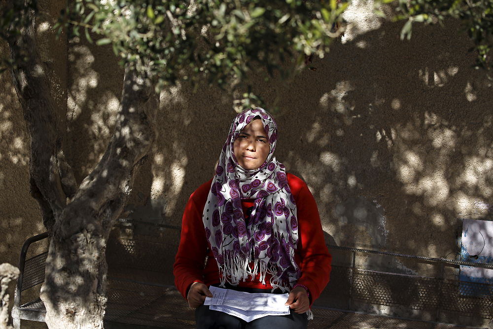 Maroua Aichaoui, 26, who is an unemployed graduate, holds her degree certificate during the meeting with journalists outside her house at the impoverished Zhor neighborhood of Kasserine, where young people have been demonstrating for jobs since last week, January 29, 2016. "I am conscious that the political and economic situation in my country right now is dramatic, the terrorist threat destabilizes the country... and since the 2011 revolution, the situation has regressed, our leaders do not take us seriously, I hope the state enables the youth to bring the country out of its crisis". Maroua said. REUTERS/Zohra Bensemra