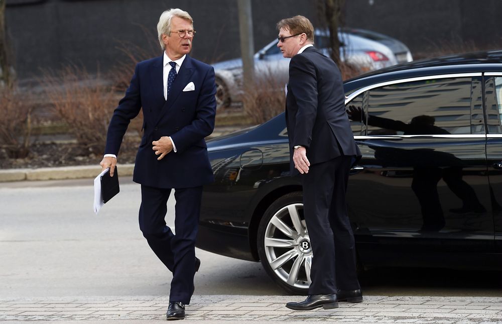 Björn Wahlroos (L), the Chairman of the Board of Nordea, arrives to the general meeting of the Finnish bio and forest industries company UPM in Helsinki, Finland on April 7, 2016. Wahlroos answered journalists' questions on the so called "Panama Papers" in connection with Nordea. Wahlroos is also the the Chairman of the Board of UPM. Bio and forest industries company UPM don't have any connection to the so called "Panama Papers". / AFP PHOTO / Lehtikuva / Vesa Moilanen / Finland OUT
